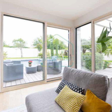 Baie vitrée coulissante bois RÉVOLUTION de BIEBER